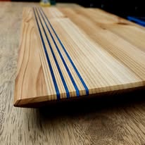 Walnut table with green epoxy river inlay