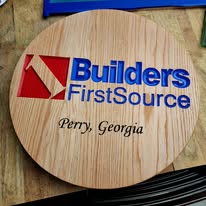 Round logo plaque with inlay
